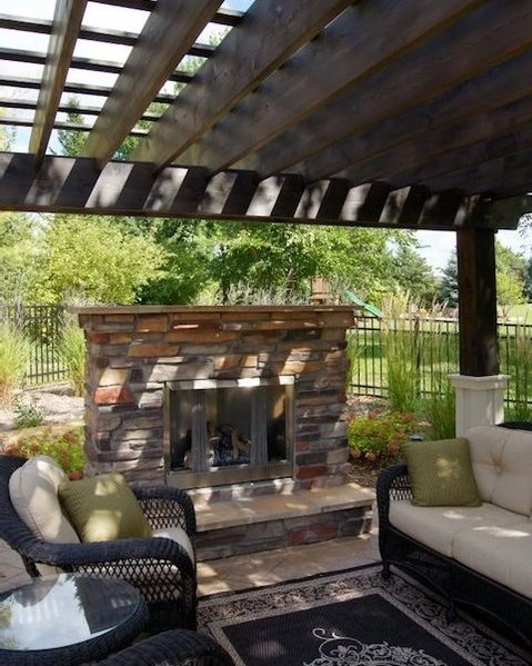 Covered Outdoor Fireplace with Pergola Shelter