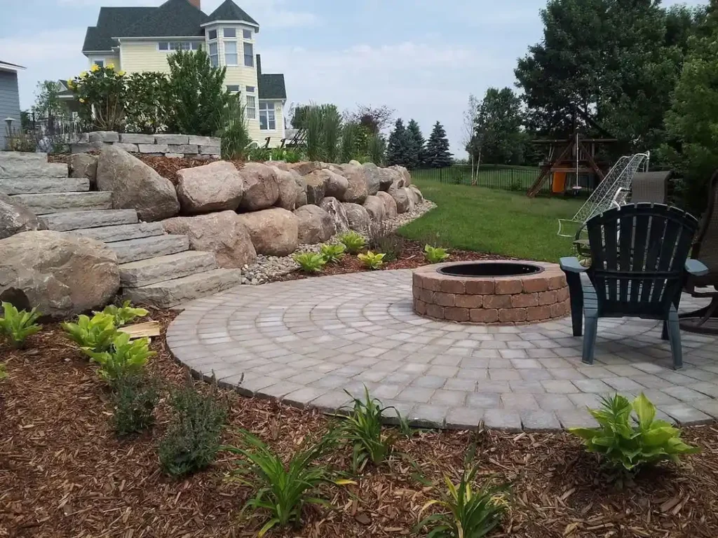Brick Fire Pit with Natural Stone Landscaping