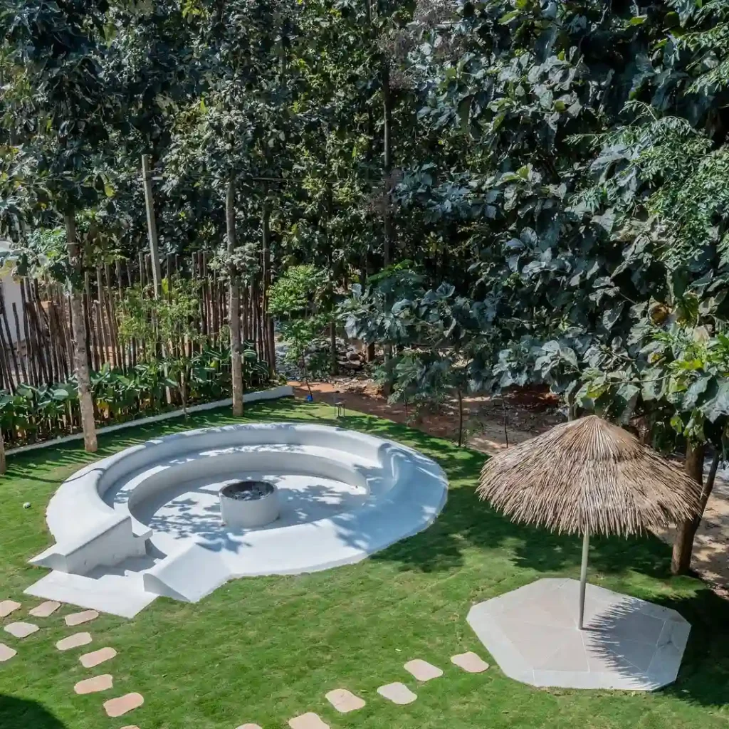 Sunken Fire Pit with Tropical Garden Setting