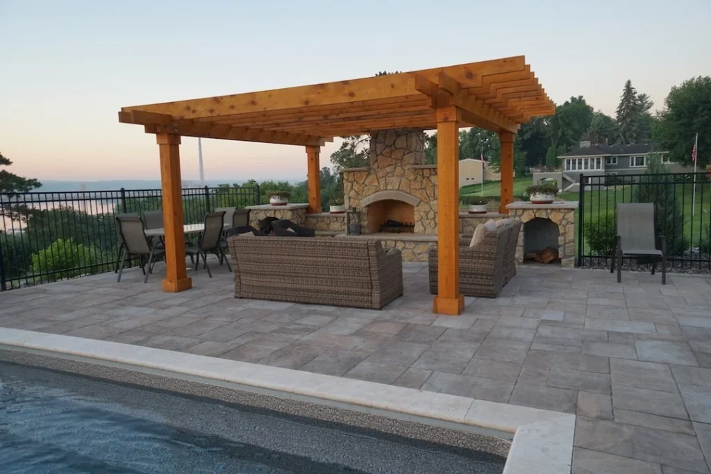 Pergola Covered Fireplace with Pool Side Location