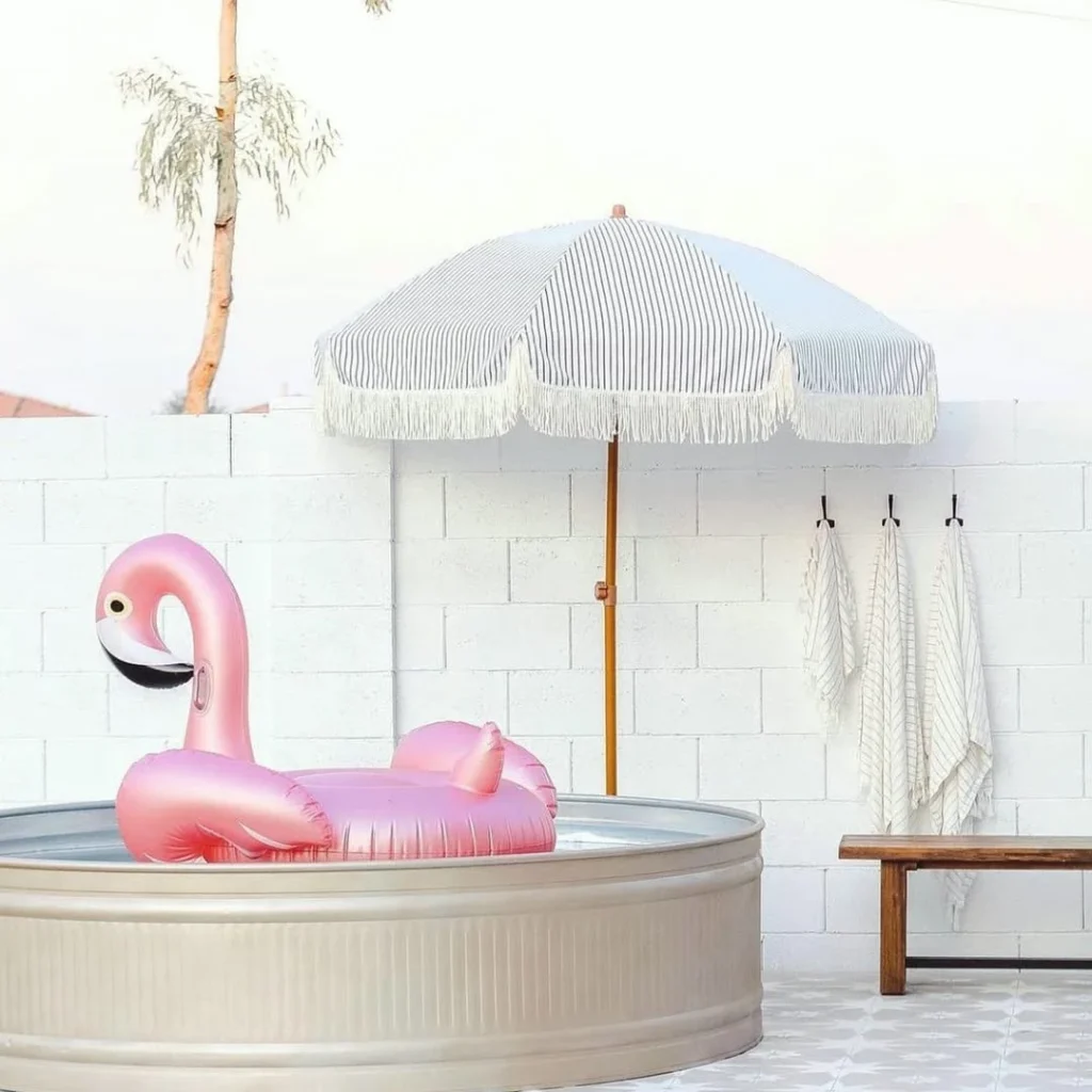 Stock Tank Pool with Flamingo Float