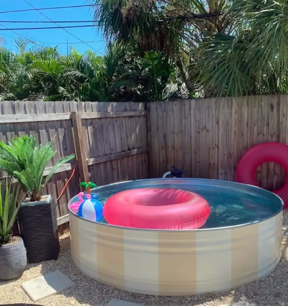 Tropical Stock Tank Pool with Pink Float