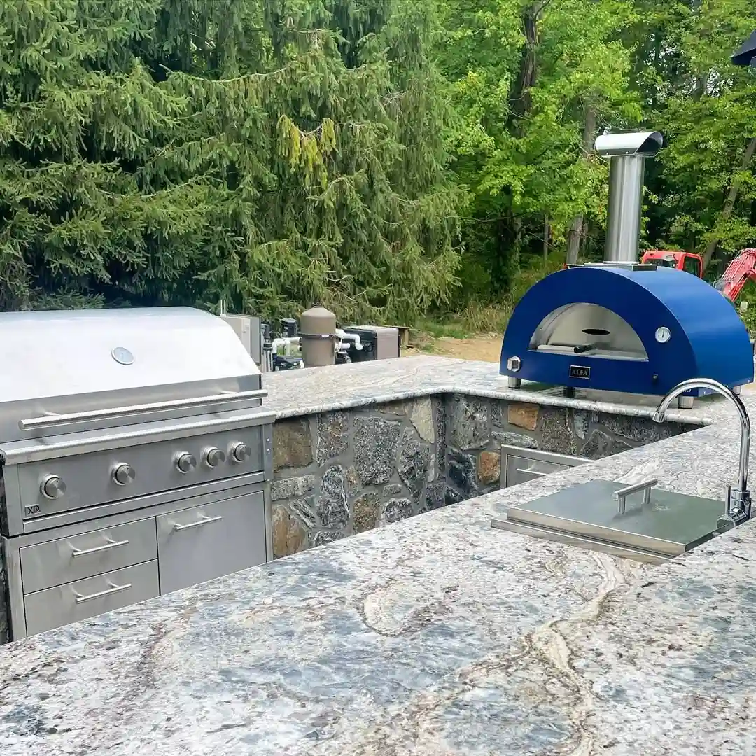 Premium Outdoor Kitchen with Blue Wood-Fired Pizza Oven