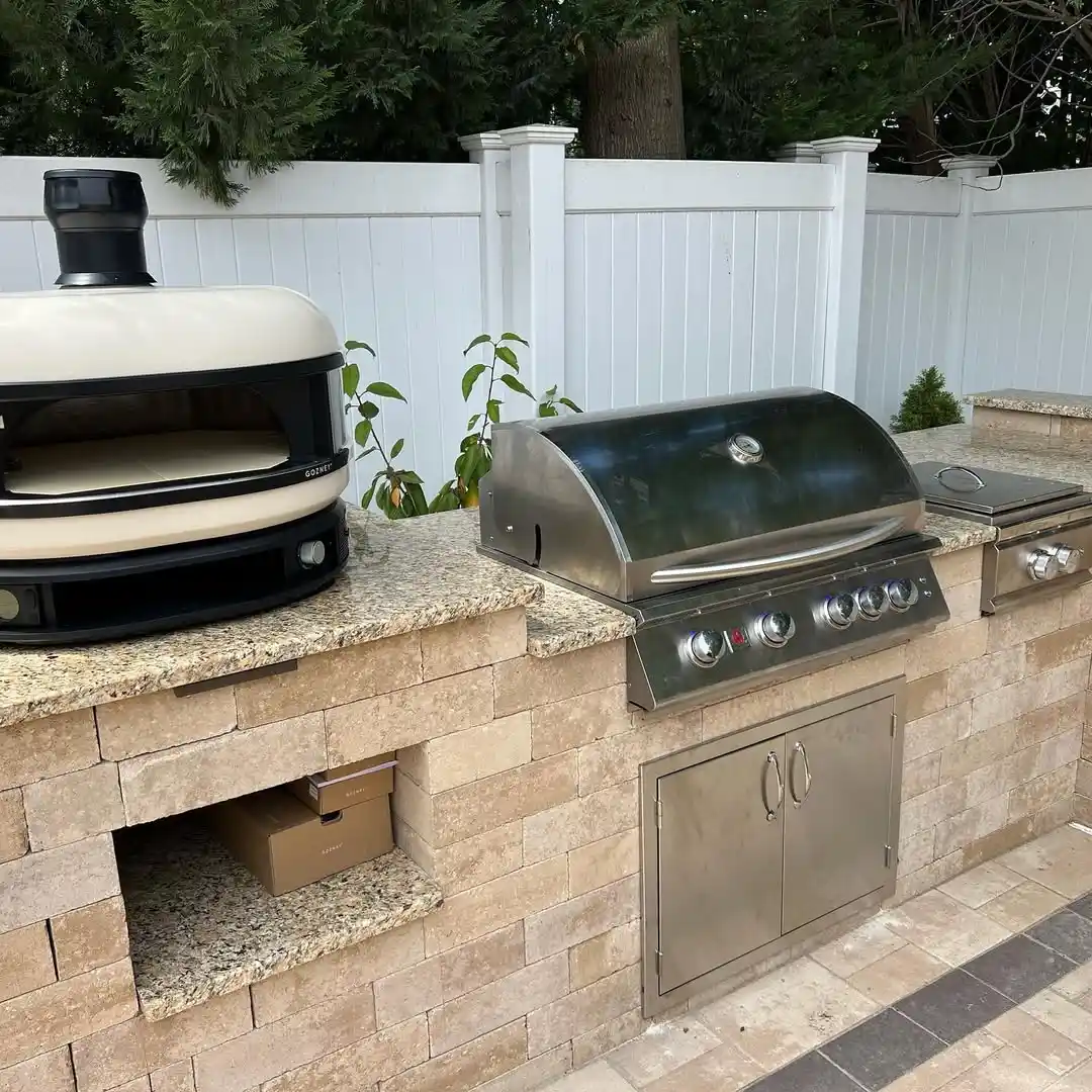Beautiful Natural Stone L-Shaped Kitchen with Pizza Oven