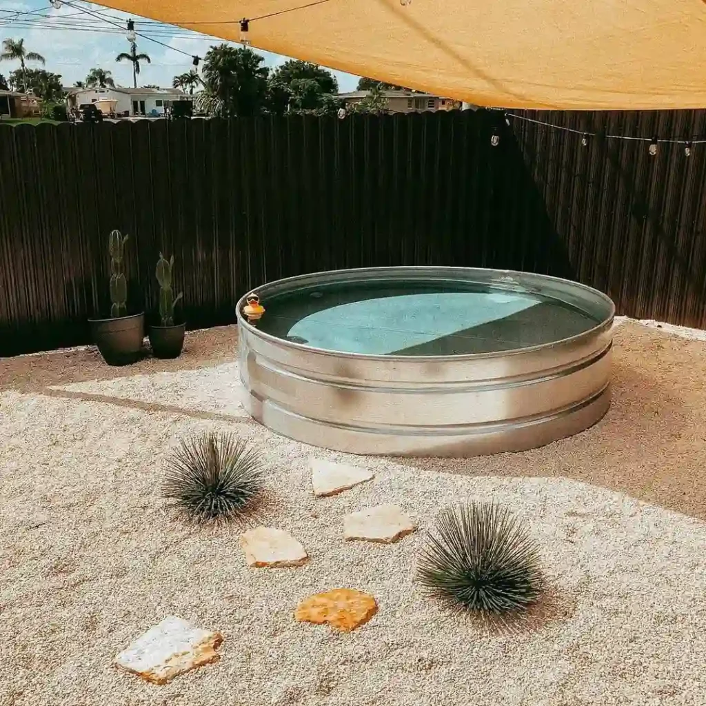 Desert Minimalist Stock Tank Pool with Natural Stone Path