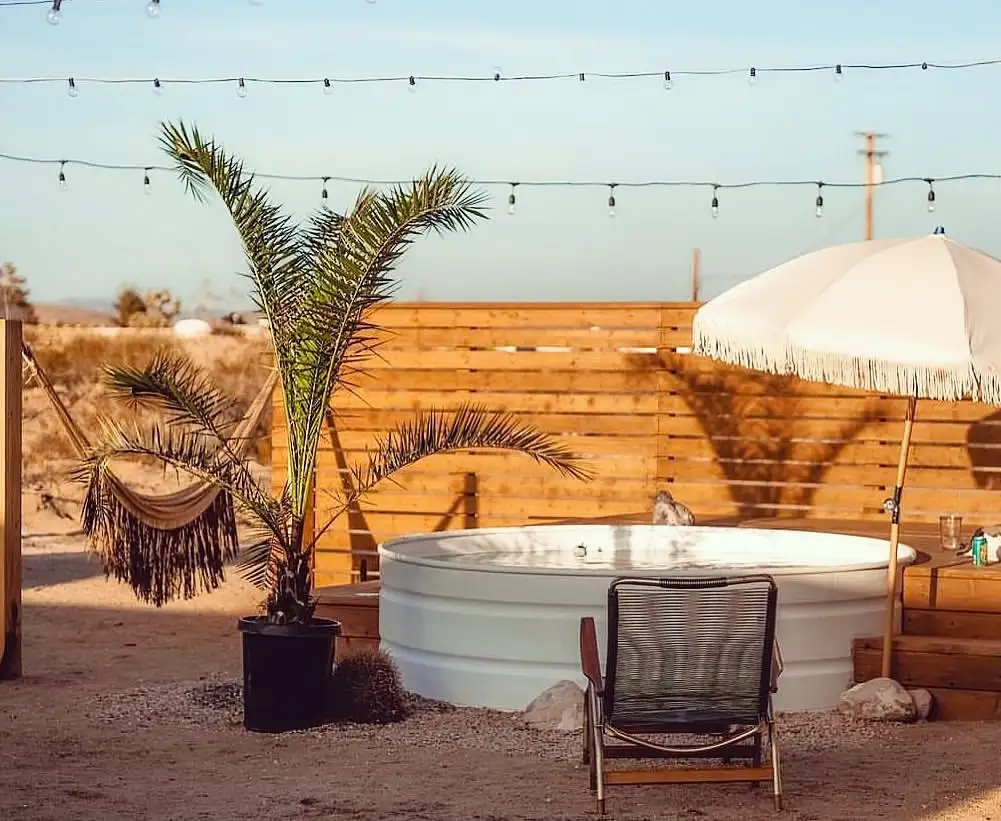 Desert Oasis Stock Tank Pool with Boho Vibes