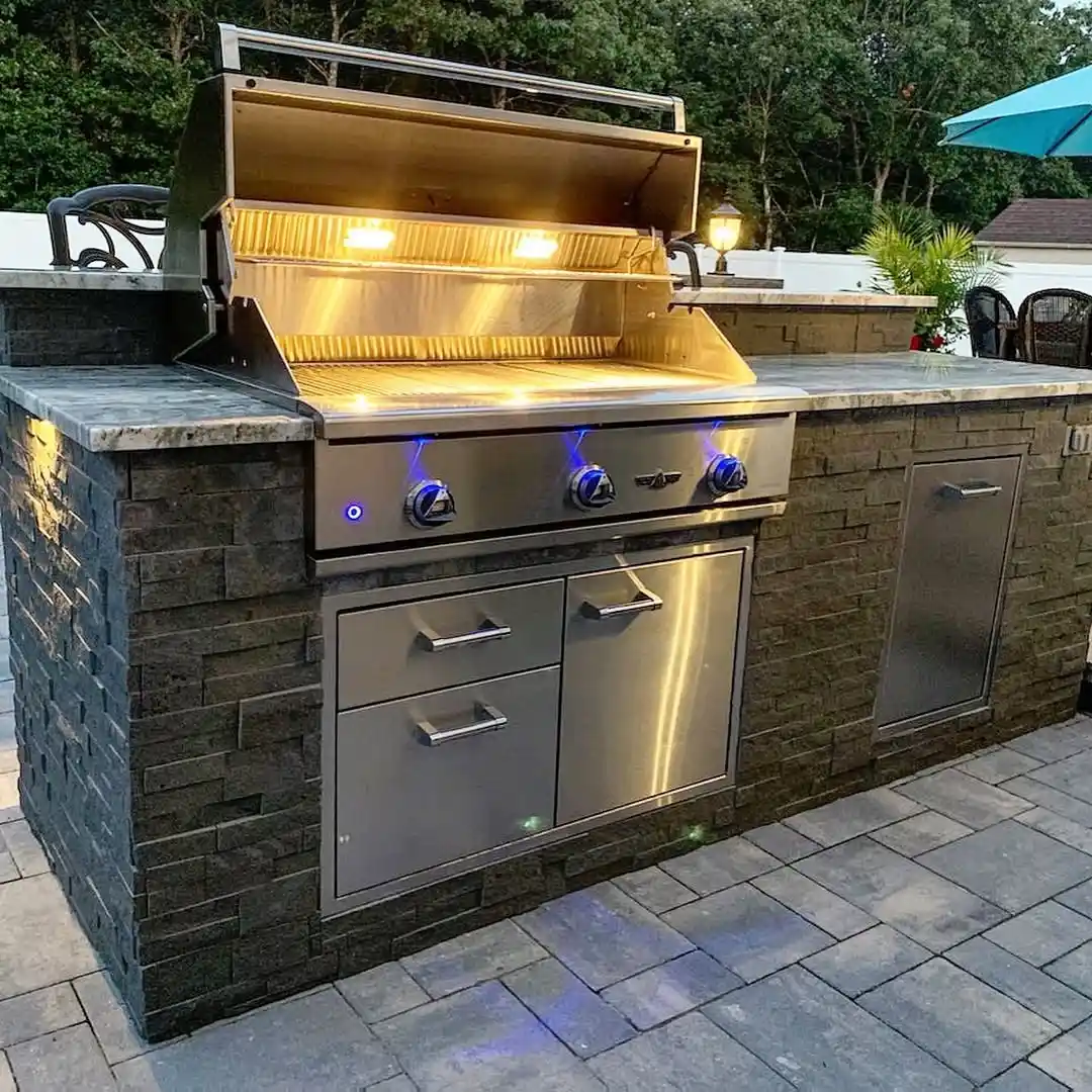 Illuminated Evening Outdoor Kitchen with Premium Features