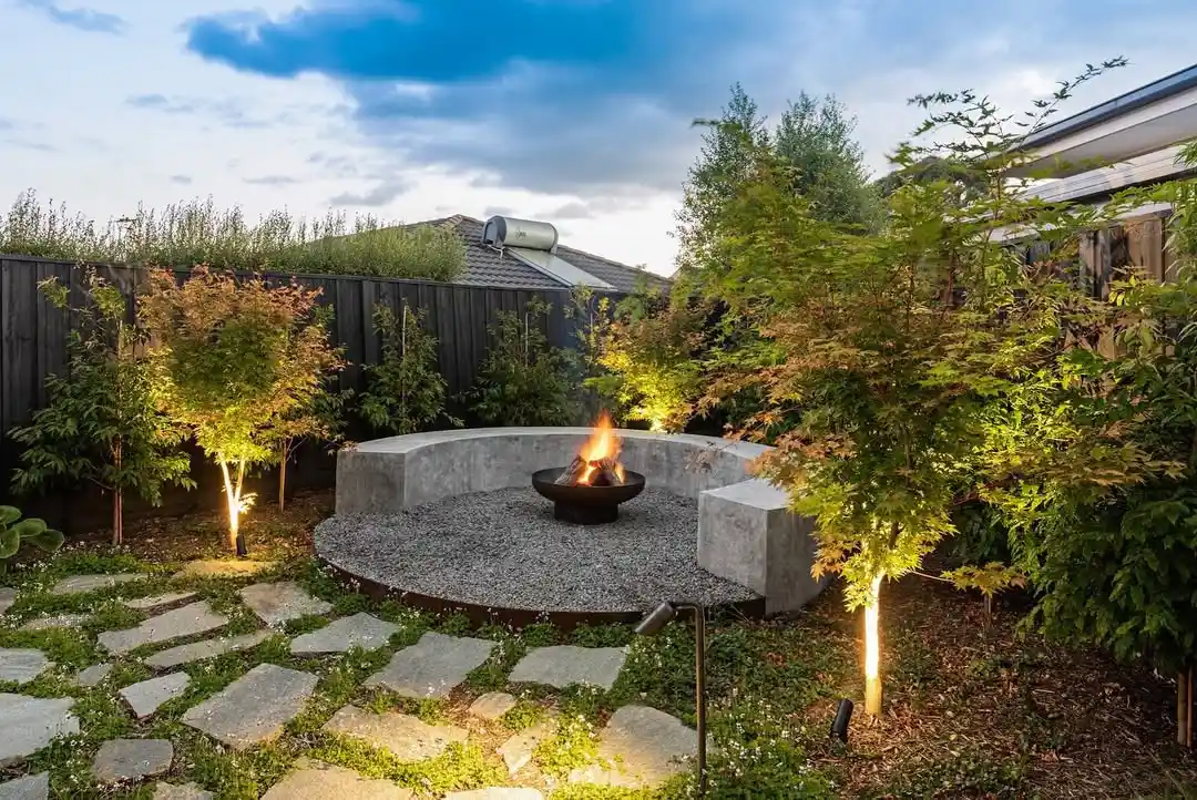 Modern Concrete Circular Fire Deck with Built-In Seating