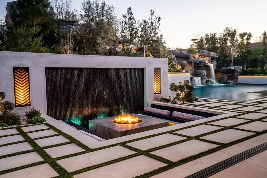 Ultra-Modern Sunken Fire Lounge with Water Features