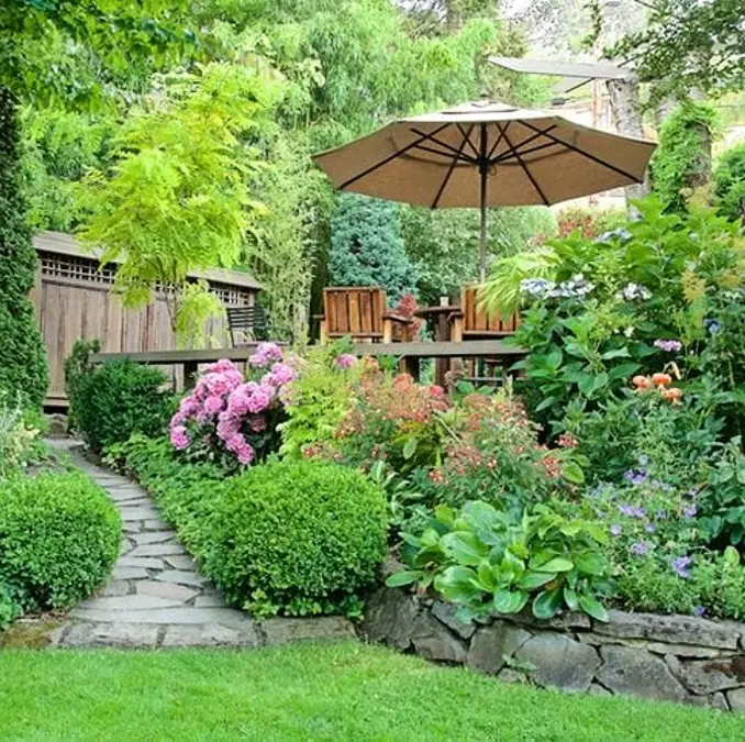Low Stone Retaining Wall with Wood Deck