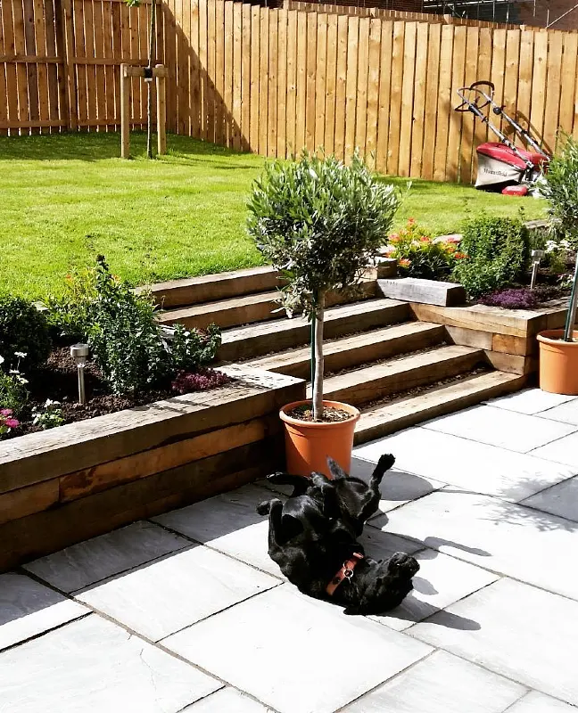 Timber Sleeper Wall with Integrated Lawn Steps