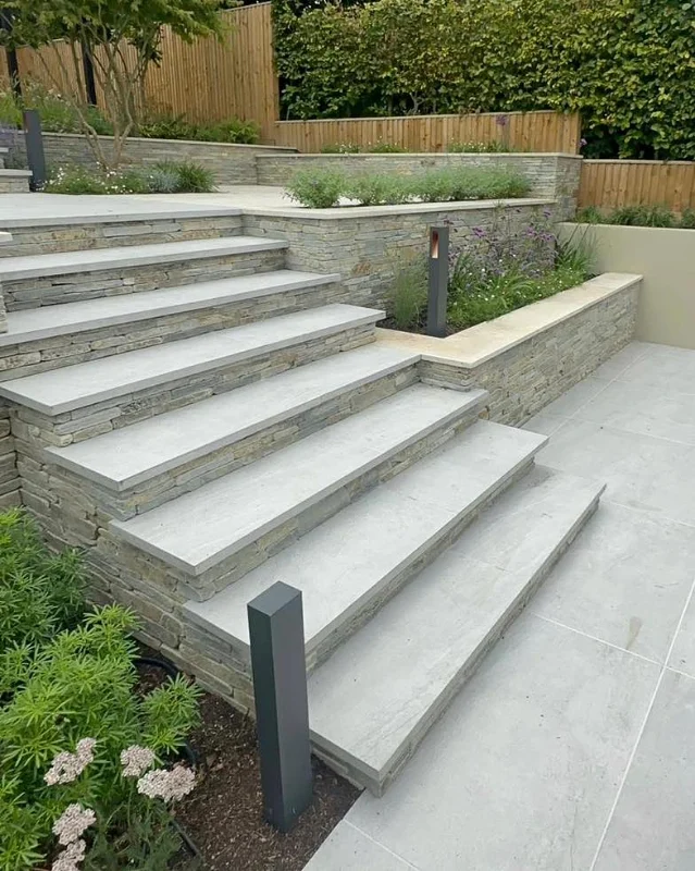 Stacked Stone Retaining Walls with Wide Treads