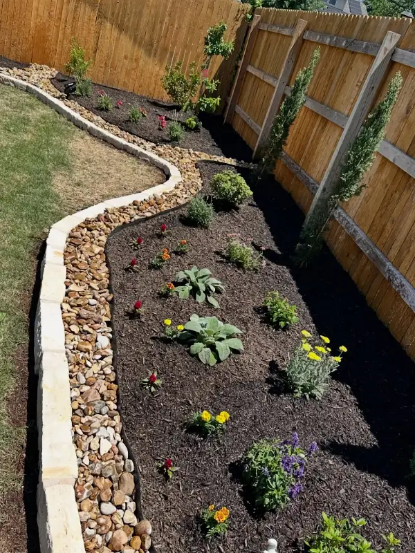 Curved Stone and River Rock Border