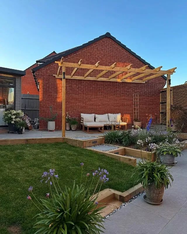 Timber-Framed Pergola and Raised Patio Bed