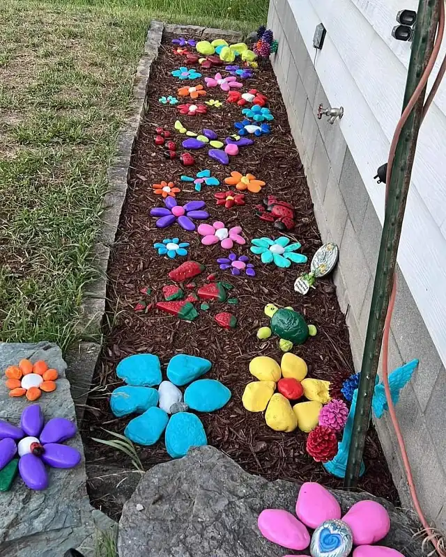 Painted Rock Critter and Flower Mulch Bed