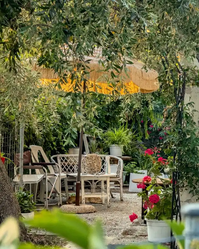 Shaded Patio Seating with Fringed Umbrella