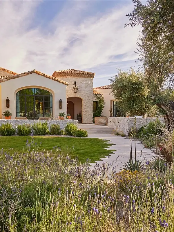 Mediterranean Villa Entry with Sawtooth Flagstone Path
